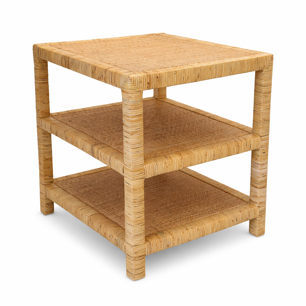 Wicker side table with three shelves on a white background