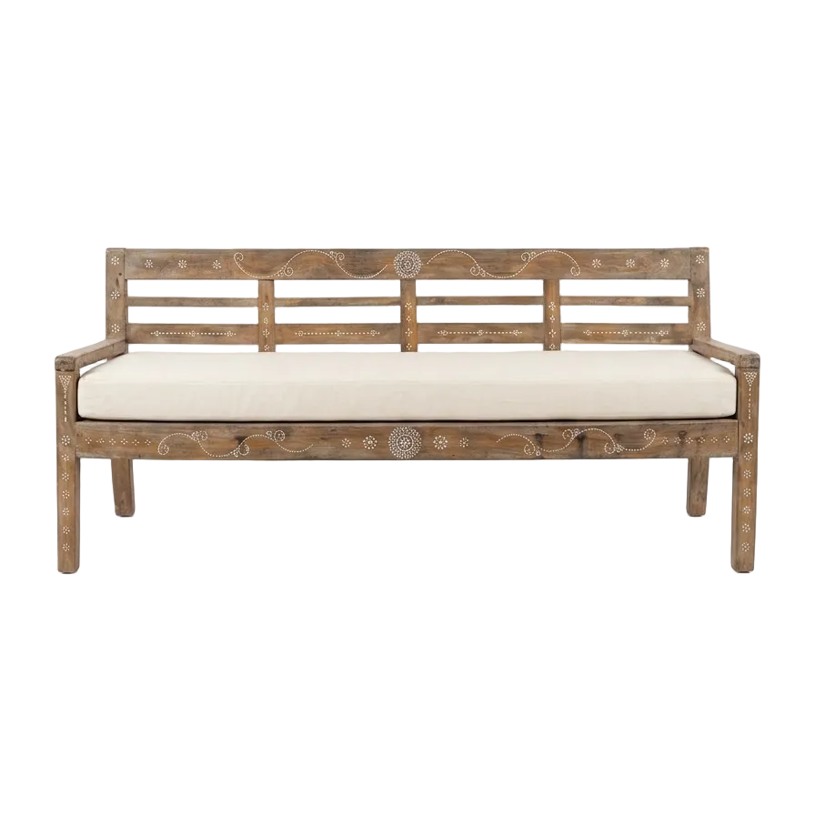 Wooden bench with shell inlay and white cushion on a white background