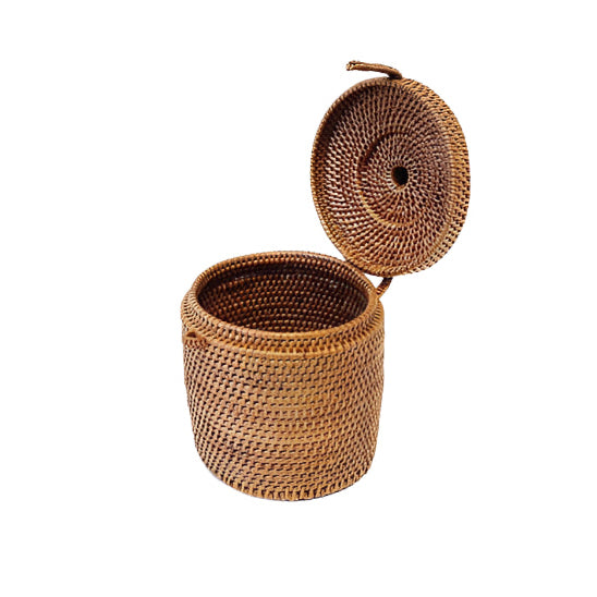 Woven basket with a lid on a white background