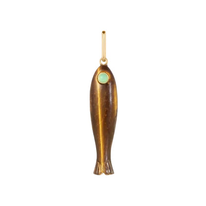Gold fish-shaped pendant with a green gemstone on a white background