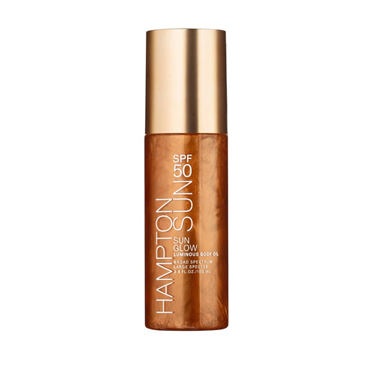 Hampton Sun Sun Glow Luminous Body Oil bottle on a white background