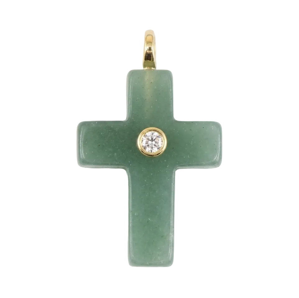 Green cross pendant with a gold setting on a white background