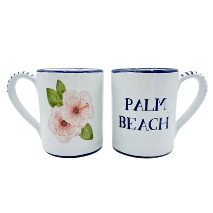 Two mugs with floral design and 'Palm Beach' text on a white background