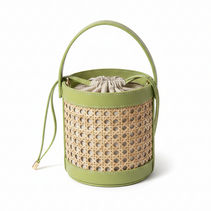 Green woven basket with a drawstring on a white background