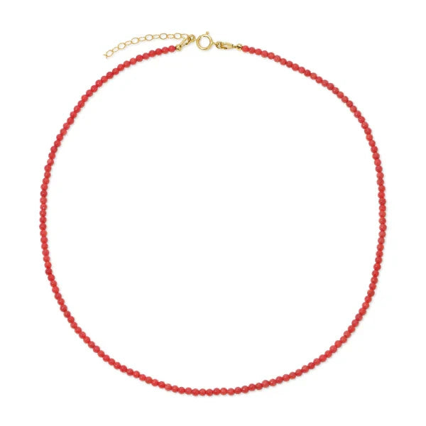 Red coral beaded necklace with a gold clasp on a white background