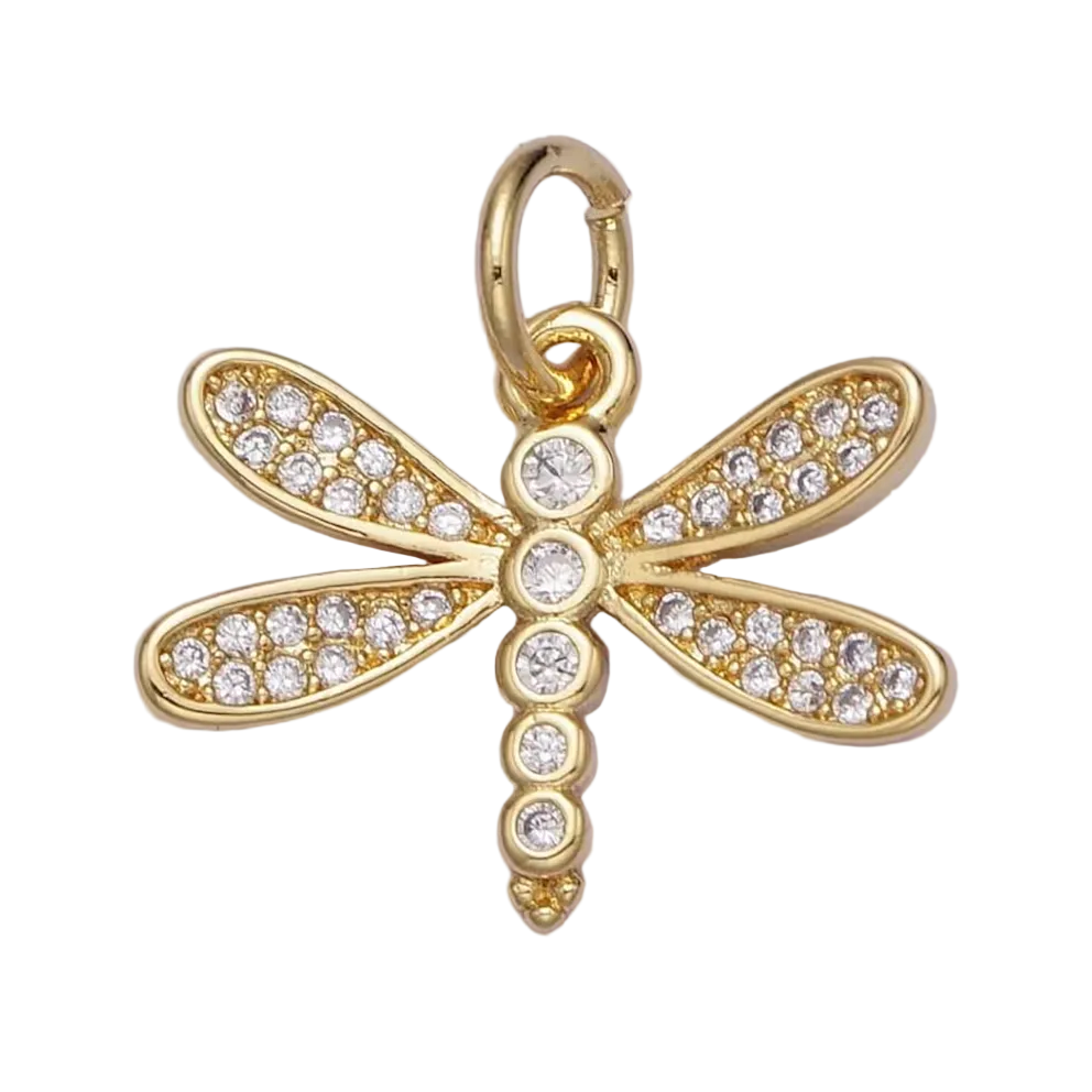 Gold dragonfly pendant with clear gemstones on a white background