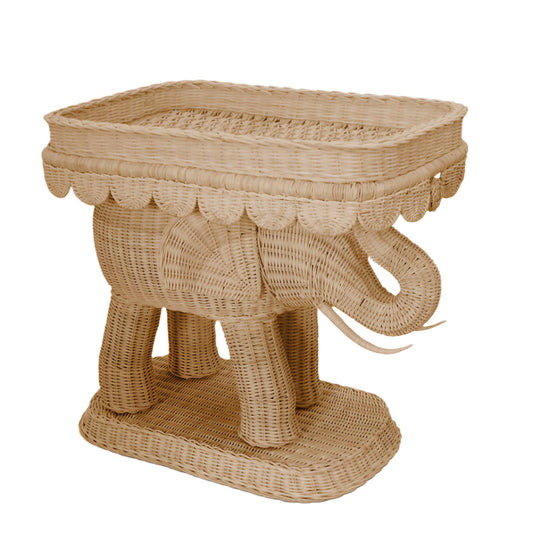 Woven elephant-shaped side table on a white background