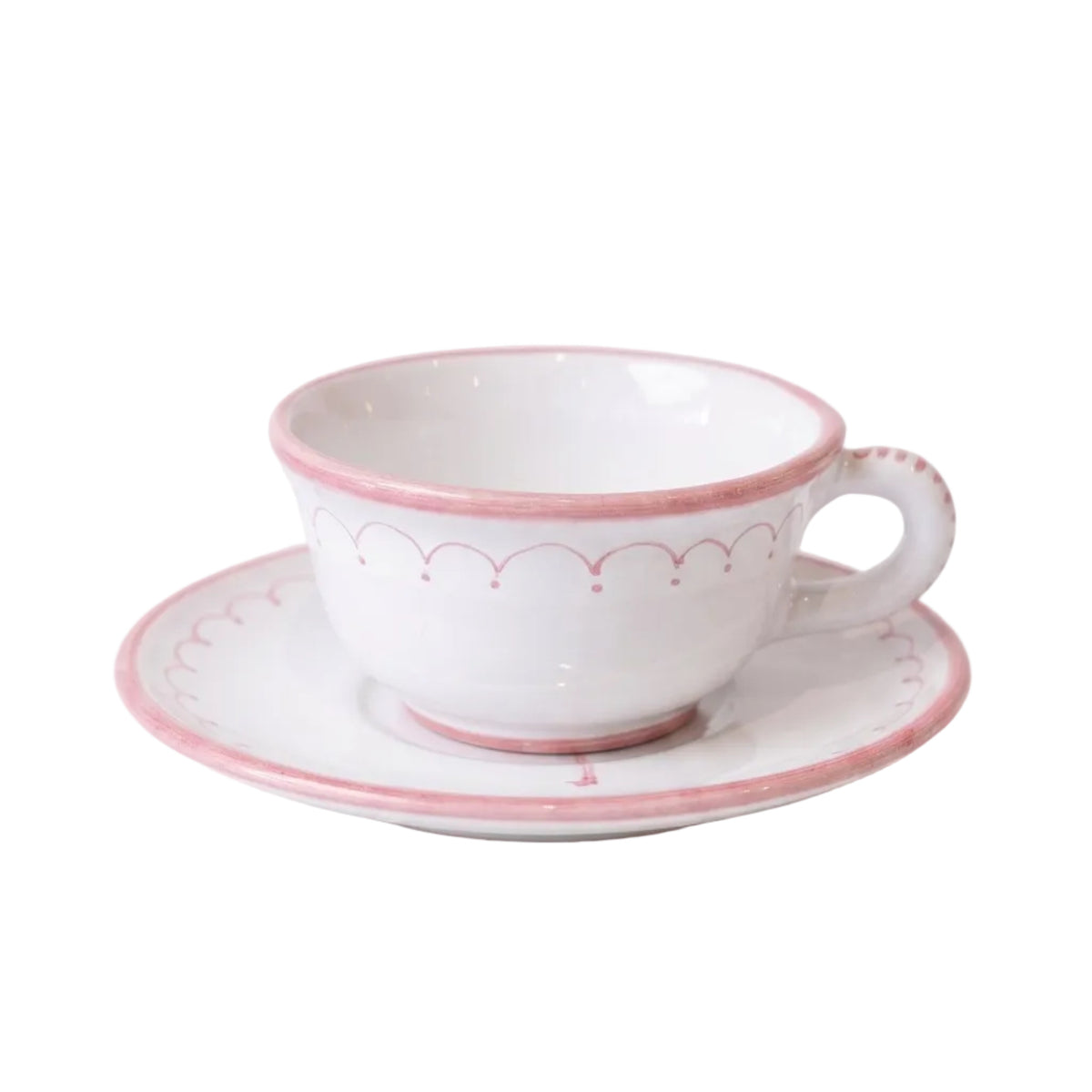 A white ceramic teacup and saucer set with delicate pink decorative borders, shown on a clean white background.