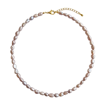 Pearl necklace with a gold clasp on a white background
