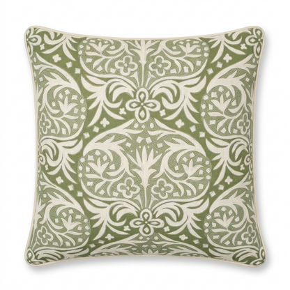 Decorative pillow with green and white pattern on a white background