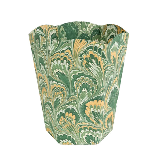 Decorative waste bin with green and gold marbled pattern on a white background