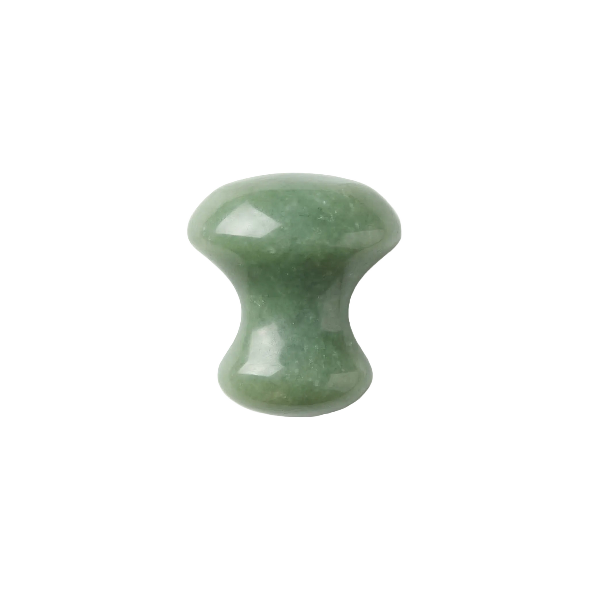 Green stone tool on a white background