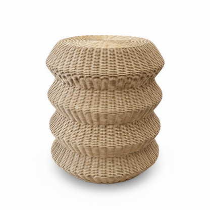 Woven stool with a ribbed texture on a white background