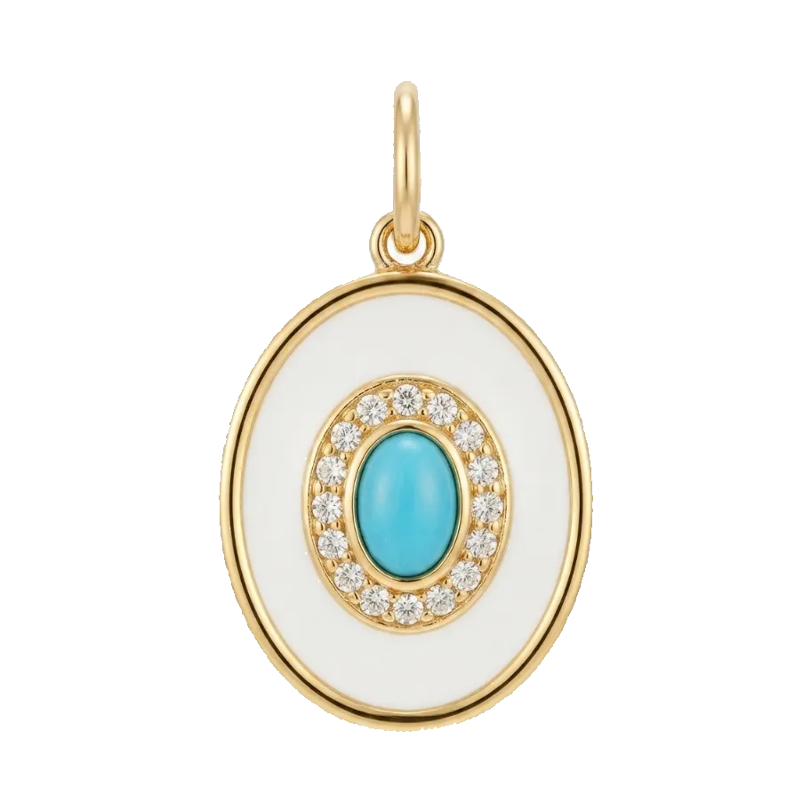 Gold oval pendant with a white enamel center, a turquoise blue oval stone, and a halo of small clear stones, shown on a light gray background.