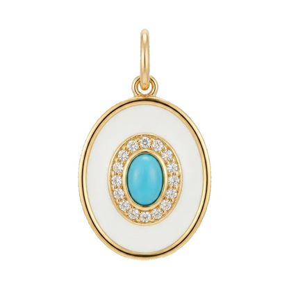 Gold oval pendant with a white enamel center, a turquoise blue oval stone, and a halo of small clear stones, shown on a light gray background.