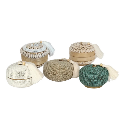 Set of decorative boxes with beaded and woven designs on a light gray background