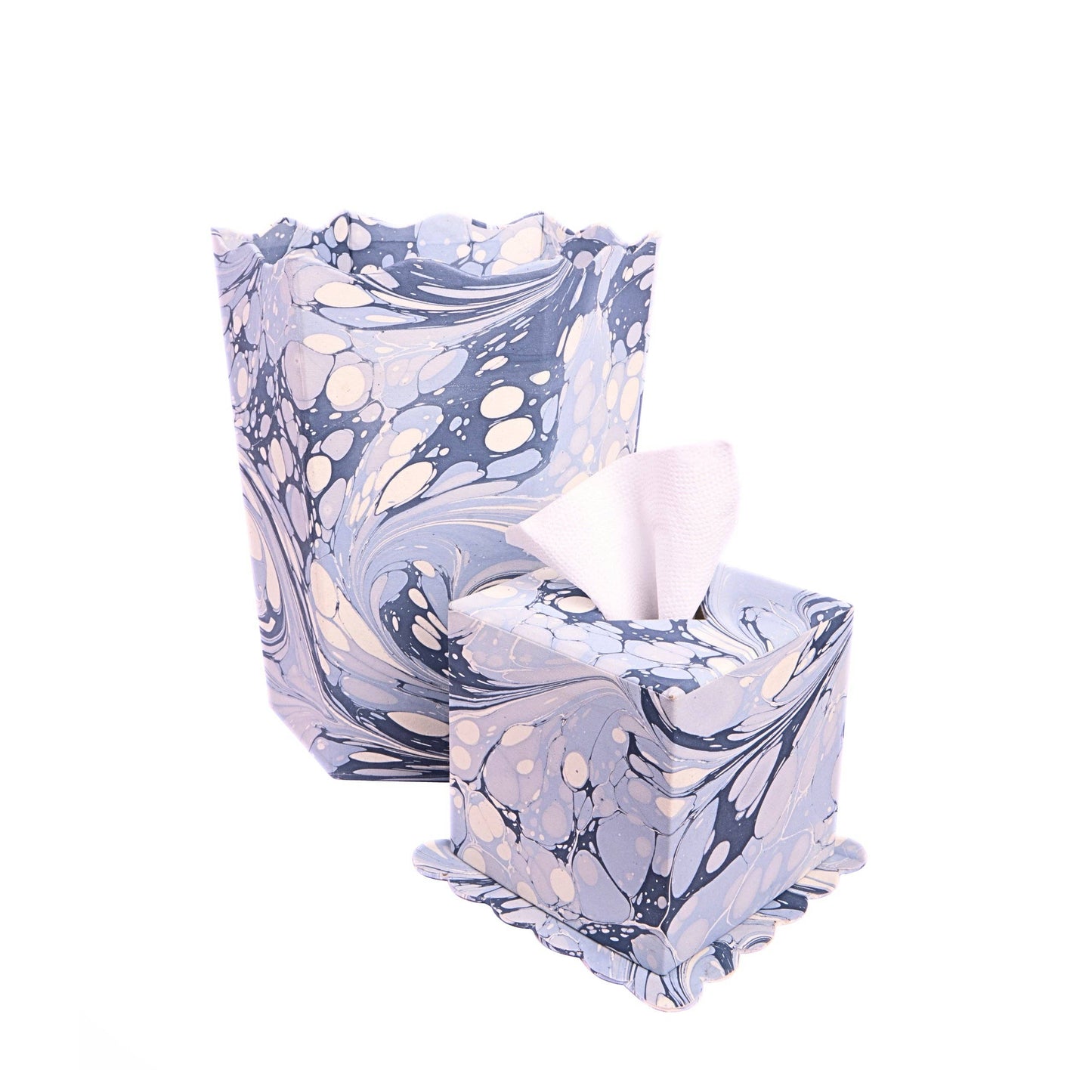 Marbled glass tissue box and waste basket on a white background