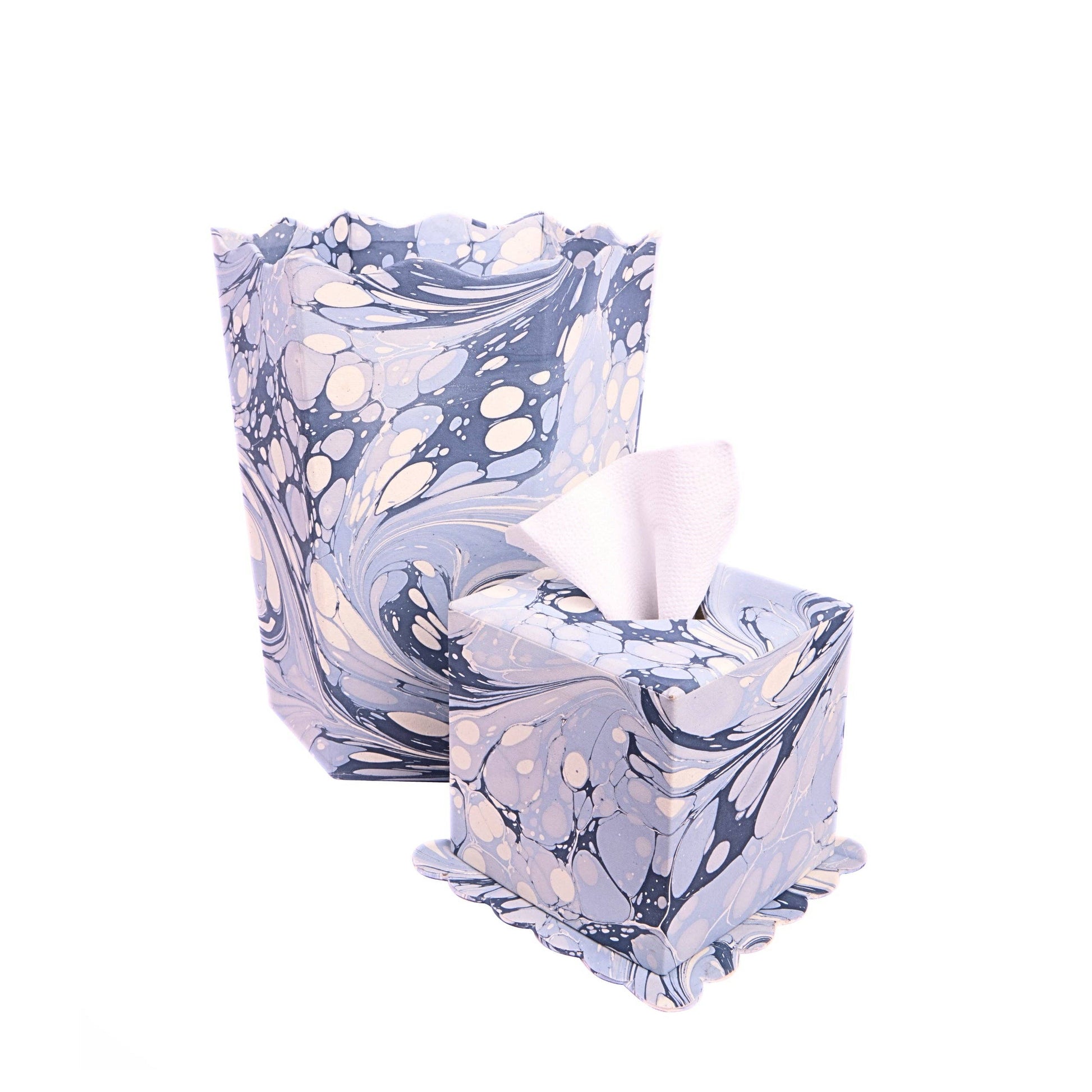 Marbled glass tissue box and waste basket on a white background