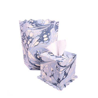 Marbled glass tissue box and waste basket on a white background
