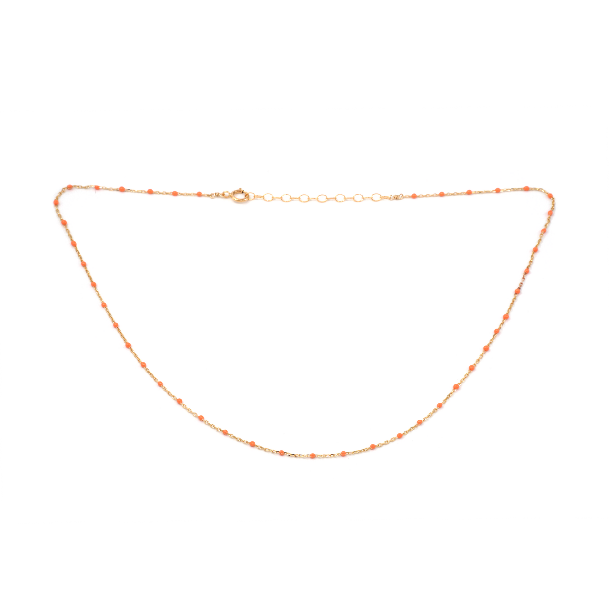 Gold chain necklace on a white background