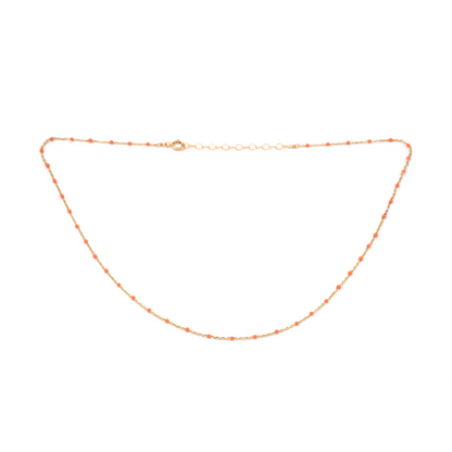 Gold chain necklace on a white background