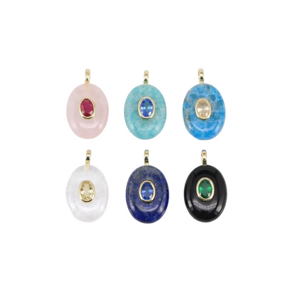Set of six colorful gemstone pendants on a white background