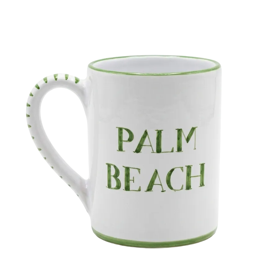 White mug with green text 'PALM BEACH' on a white background