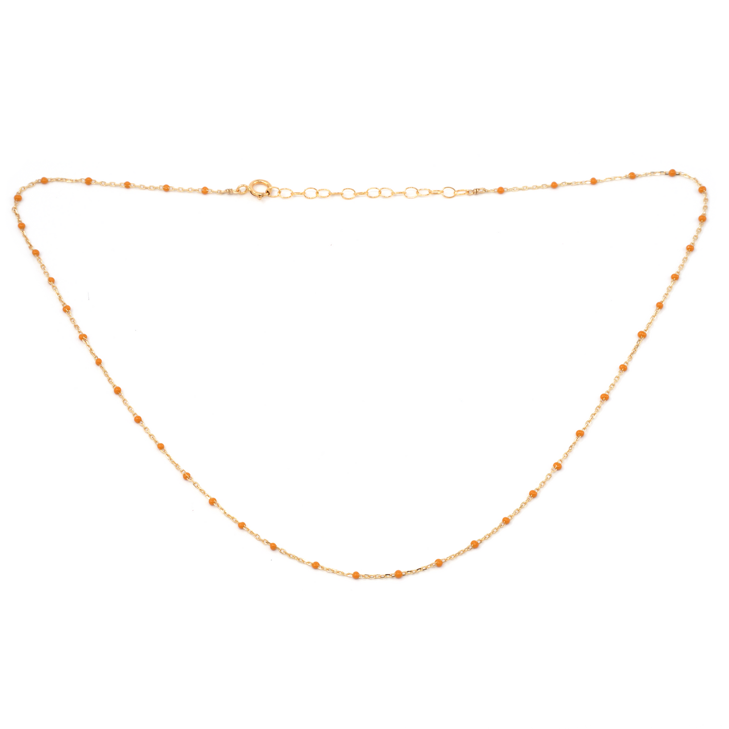 Gold chain necklace on a white background