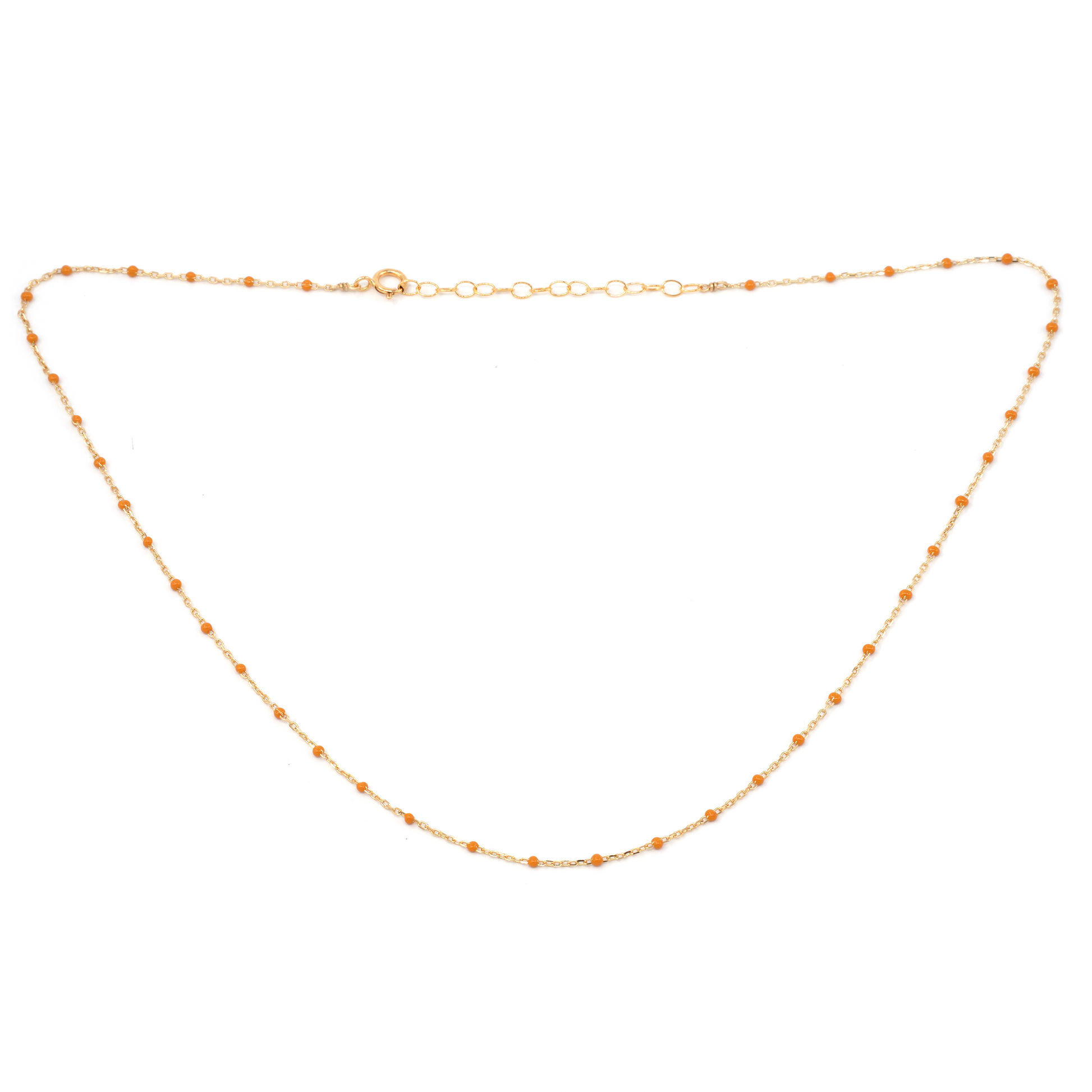 Gold chain necklace on a white background