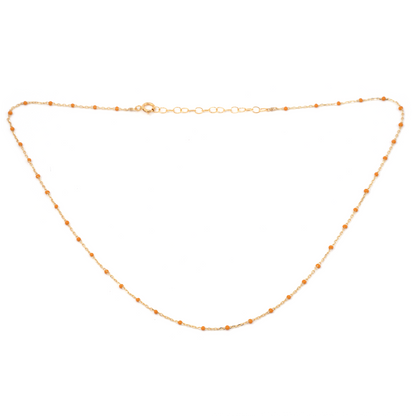 Gold chain necklace on a white background