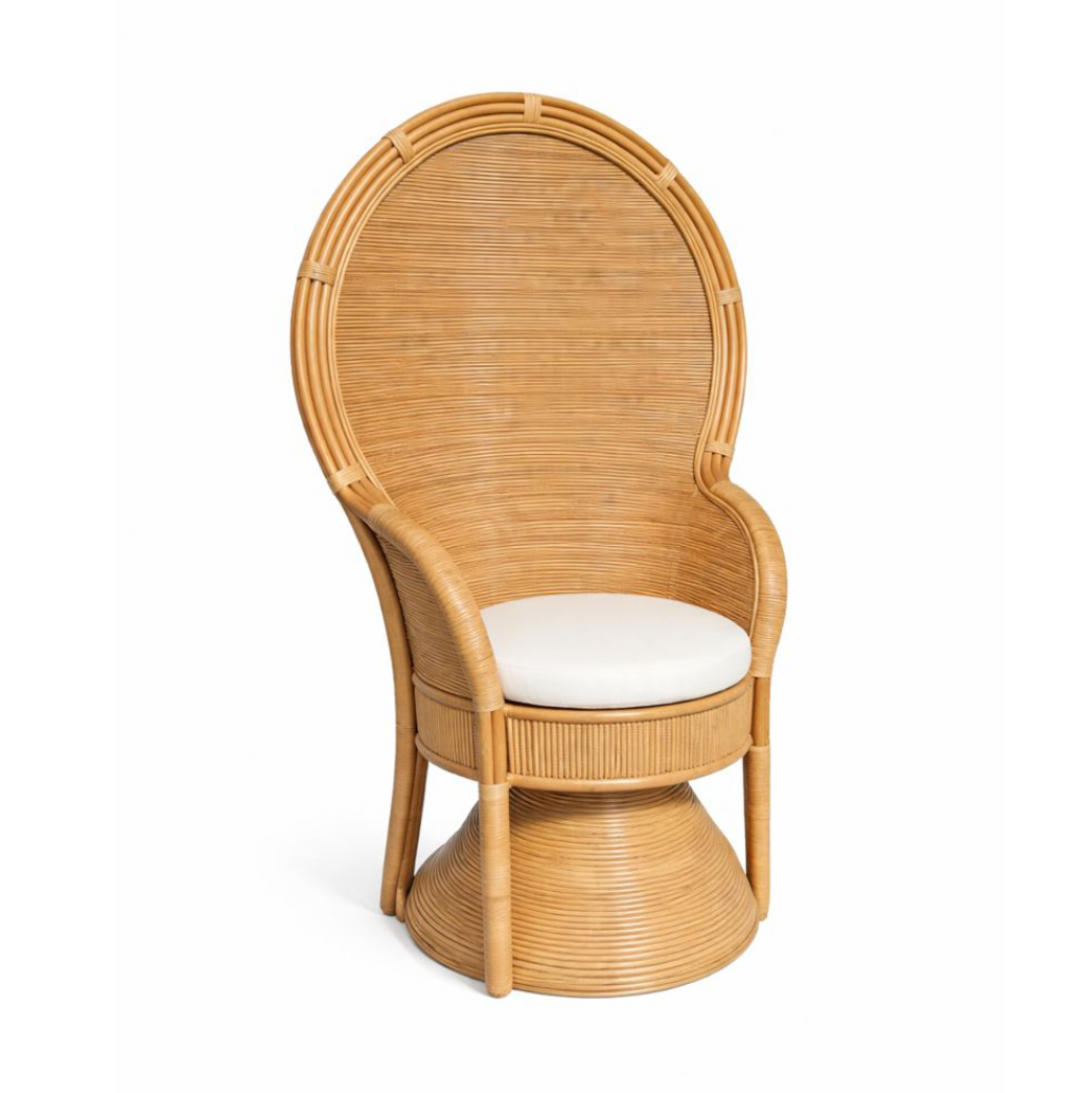 Wicker chair with a white cushion on a white background