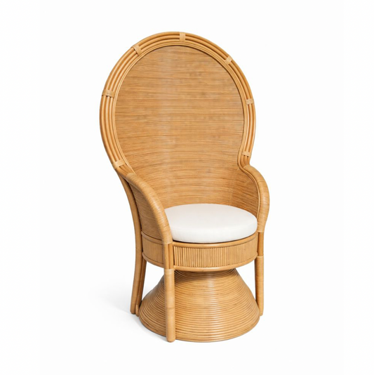 Wicker chair with a white cushion on a white background
