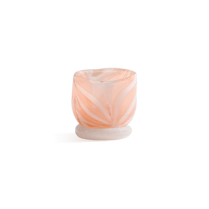 Pink and white marbled candle holder on a white background