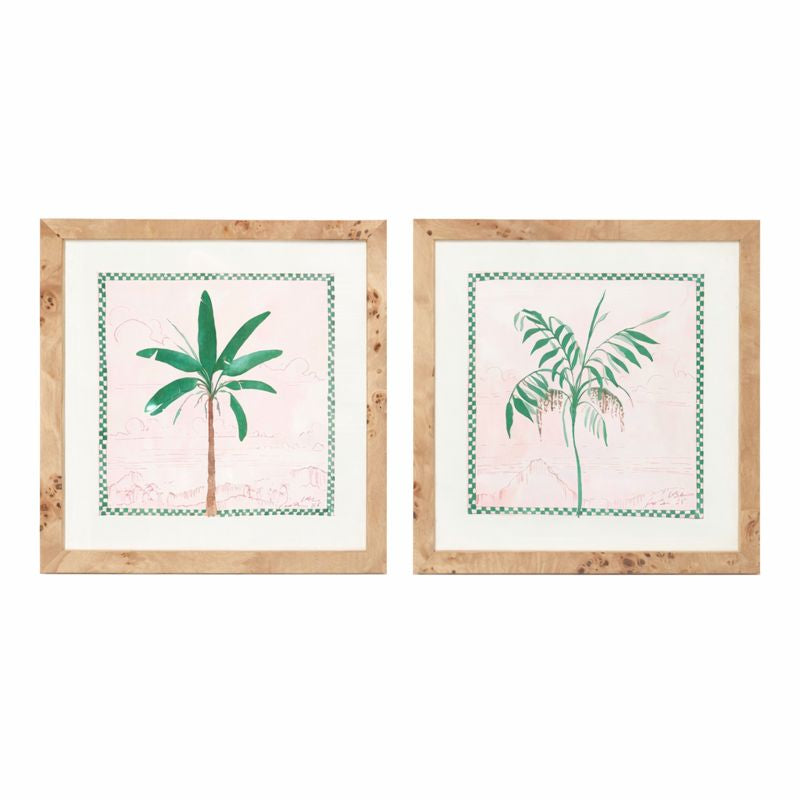 Two framed prints of palm trees on a white background