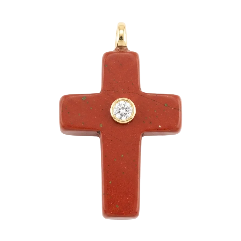 Red cross pendant with a gold border and central gemstone on a white background