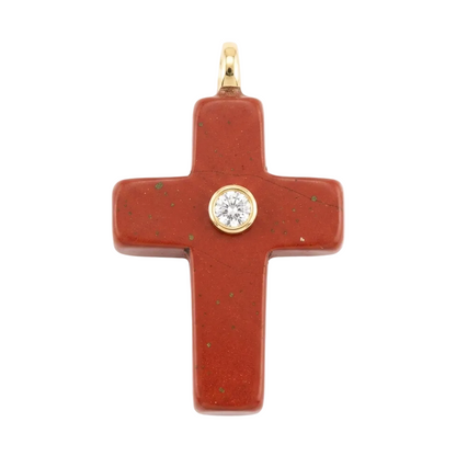 Red cross pendant with a gold border and central gemstone on a white background