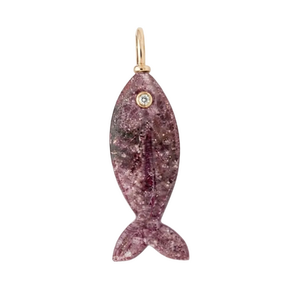 A fish-shaped pendant or charm made of sparkling purple crystal with a small gold loop at the back and a clear stone in the eye, shown on a plain white background.