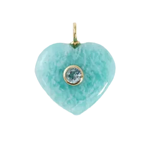 Heart-shaped turquoise pendant with a clear gemstone on a white background