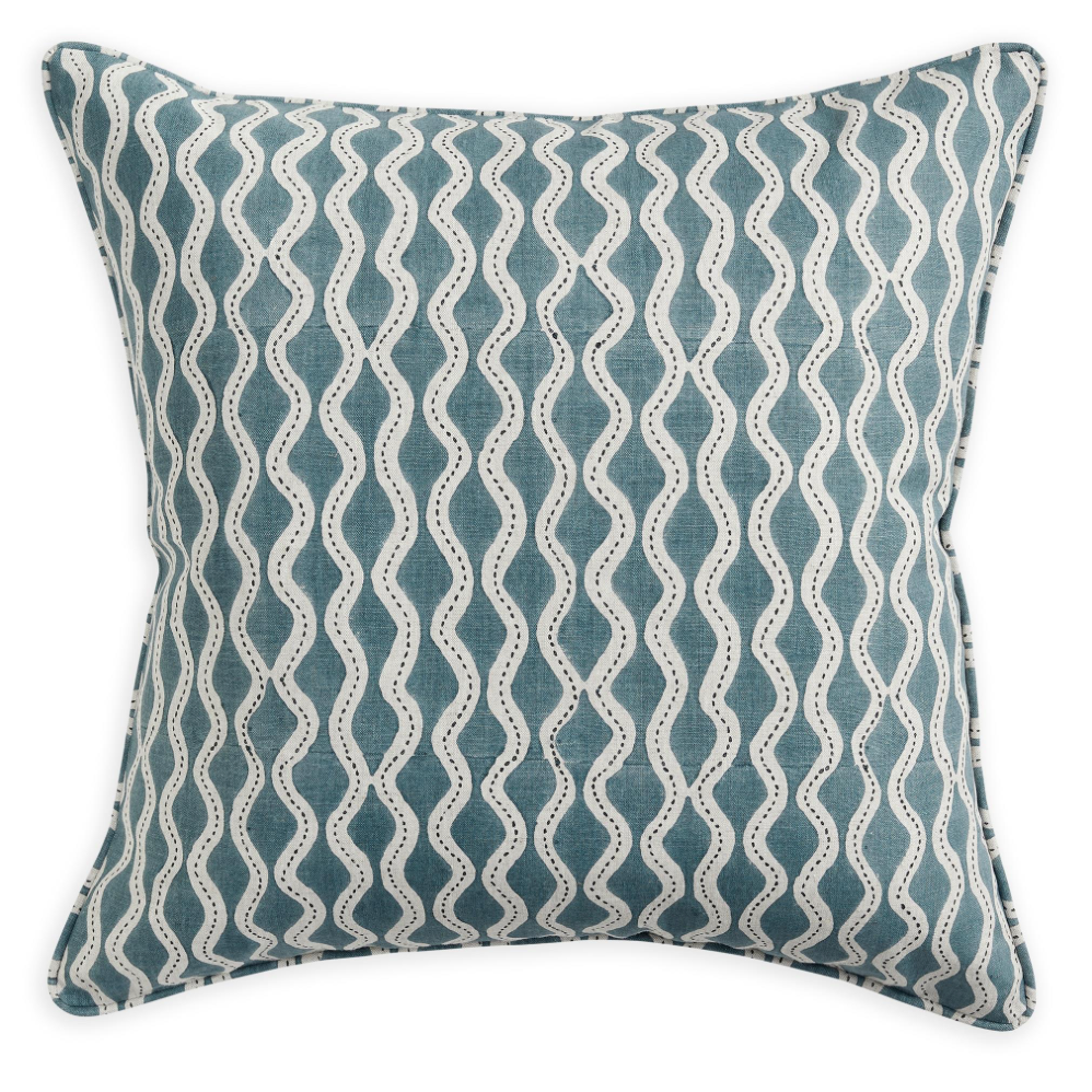 A square throw pillow featuring a vertical wavy stripe pattern in teal blue and off-white, set against a plain white background.