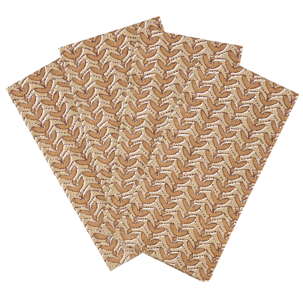 Block printed napkin set with repeating geometric pattern in tan, brown, and cream, arranged overlapping on a plain white background.