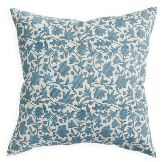 A square throw pillow featuring a blue floral vine pattern printed on a cream-colored fabric background, shown against a plain white studio background.