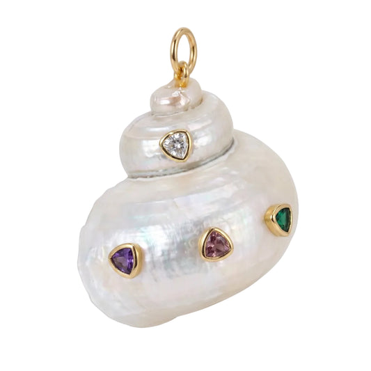 A gold shell-shaped pendant featuring a large iridescent pearl shell with small heart-shaped gemstone accents in purple, green, and clear crystal, set against a plain white background.