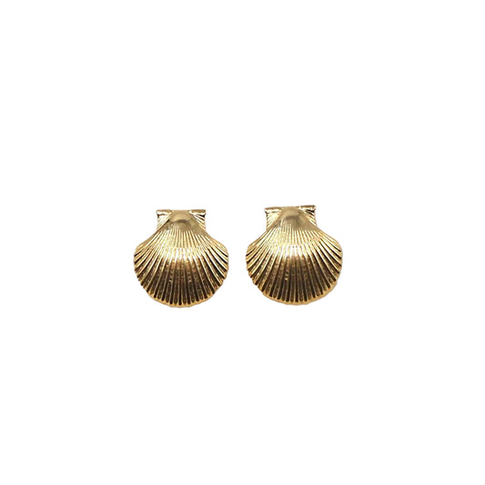 Pair of gold scallop shell earrings on a beige background