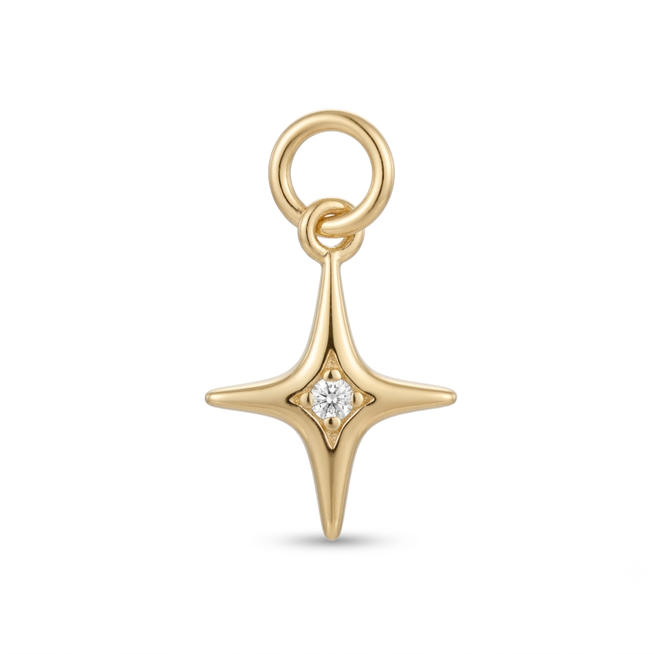 Gold star-shaped pendant with a diamond on a white background