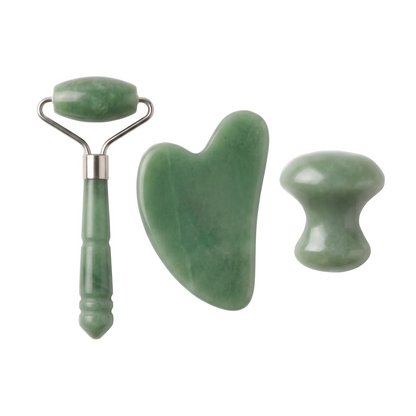 A three-piece jade roller and gua sha facial massage set on a plain white background, featuring a green jade roller with a silver metal frame, a green jade gua sha blade, and a green jade massage knob.