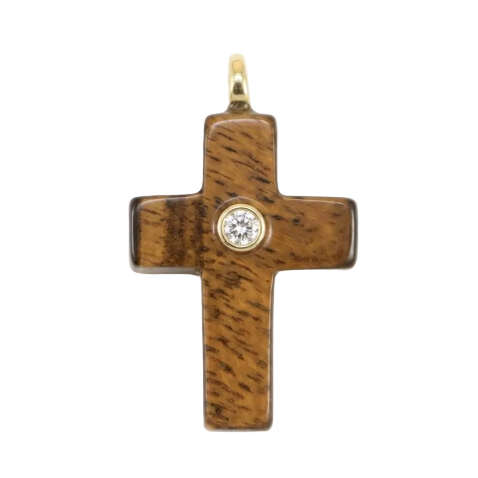 Gemstone cross pendant with a central gemstone on a white background