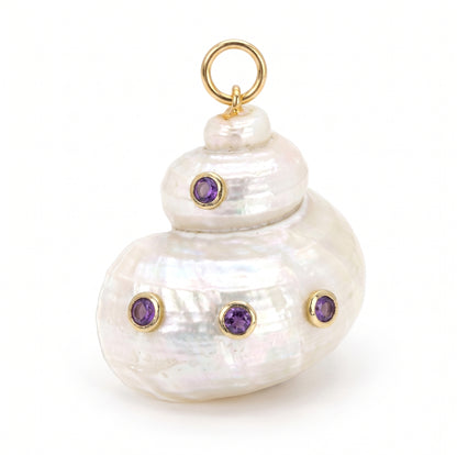 A seashell-shaped pearl pendant with gold-tone metal settings and small clear rhinestone accents, shown on a plain white background.