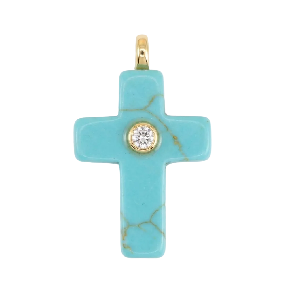 Turquoise cross pendant with gold accents on a white background