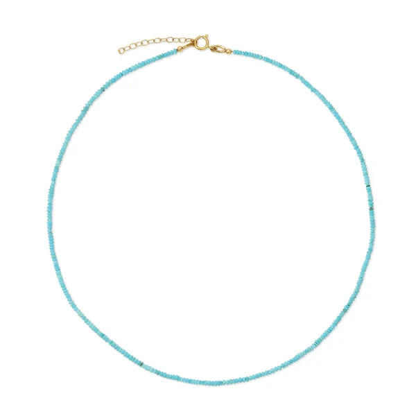 Turquoise beaded necklace with a gold clasp on a white background