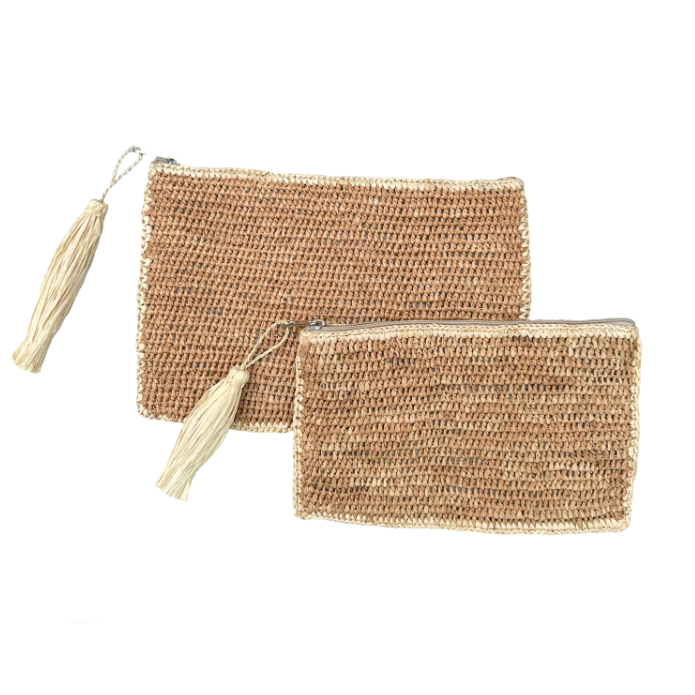 Two woven pouches with tassels on a white background